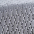 Fauteuil Evelyn en velours à oreilles et haut dossier